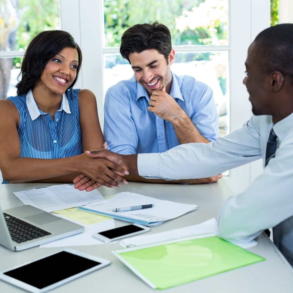 happy-couple-shaking-hands-with-real-estate-agent.jpg happy-couple-shaking-hands-with-real-estate-agent.jpg